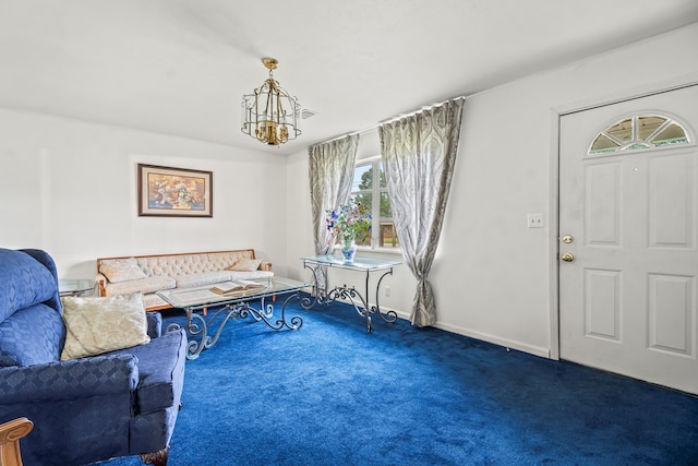 702 Highland St, Dothan, AL 36301 - living room featuring carpet, a chandelier, and baseboards