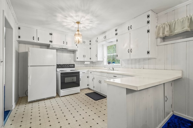 702 Highland St, Dothan, AL 36301 - kitchen with white appliances, a peninsula, and white cabinetry