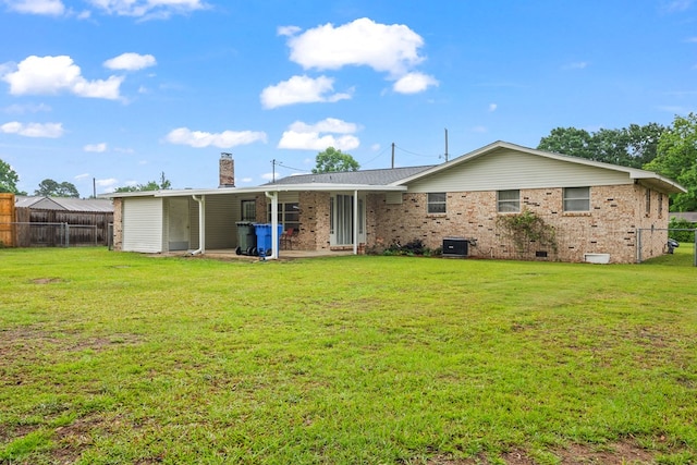 702 Highland St, Dothan, AL 36301 - back of house with brick siding, crawl space, and a chimney
