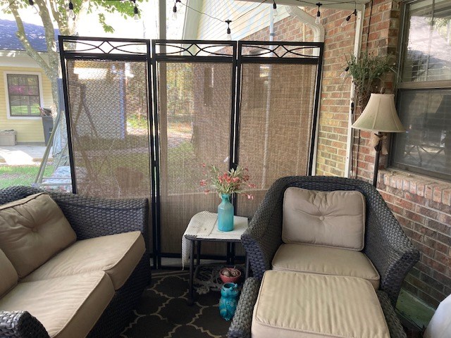 sunroom / solarium with plenty of natural light