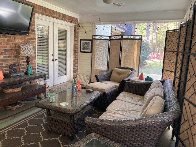 view of patio with outdoor lounge area and french doors