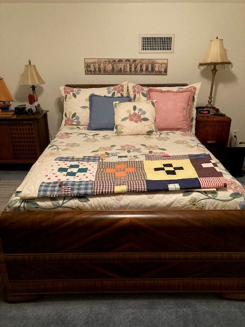 bedroom with carpet and visible vents