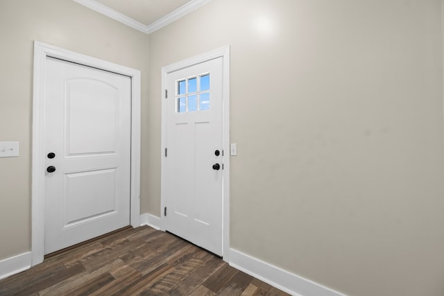 entrance foyer featuring baseboards, ornamental molding, and dark wood-type flooring