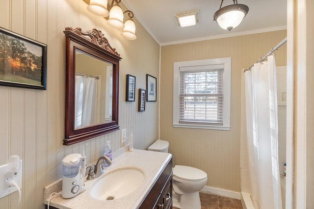 bathroom with a shower with shower curtain, vanity, toilet, and crown molding