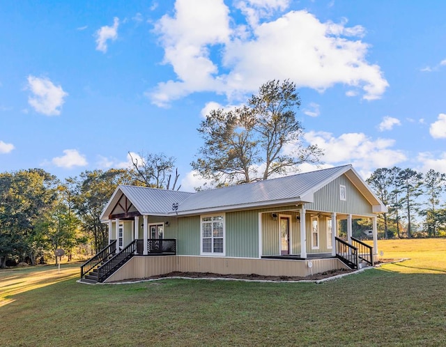 view of front facade with a front yard and a porch