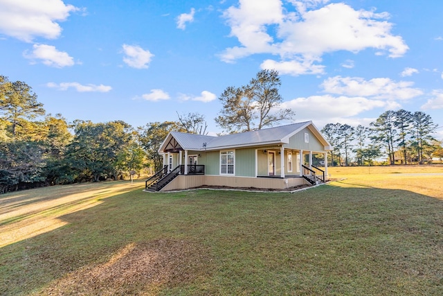 view of front of house with a front lawn and covered porch