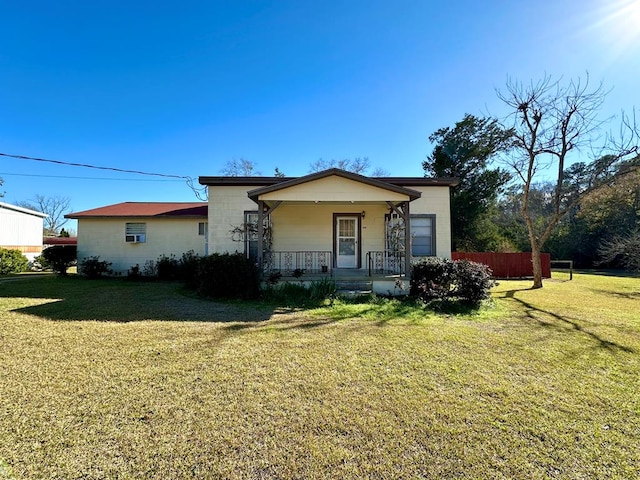 bungalow-style home with a front yard and a porch