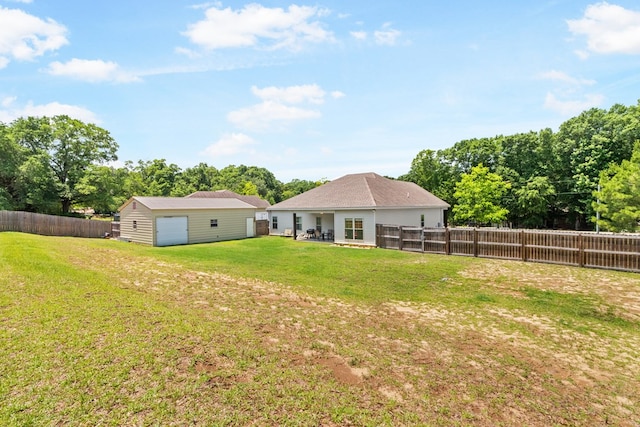 465 Choc Hill Rd, Dothan, AL 36303 - rear view of house with a fenced backyard, an outbuilding, and a patio