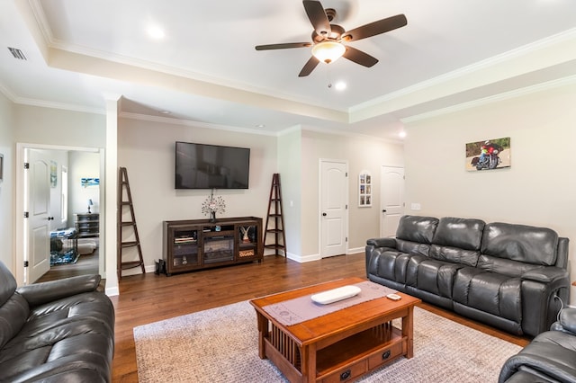 465 Choc Hill Rd, Dothan, AL 36303 - living room featuring ceiling fan, wood finished floors, a raised ceiling, ornamental molding, and recessed lighting