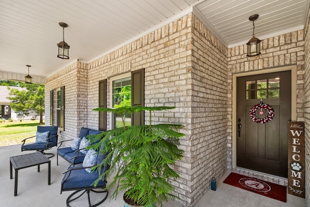 465 Choc Hill Rd, Dothan, AL 36303 - doorway to property with covered porch and brick siding