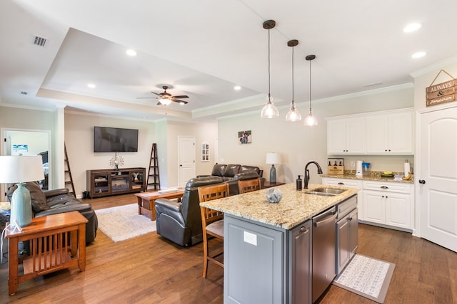 465 Choc Hill Rd, Dothan, AL 36303 - kitchen featuring stainless steel dishwasher, open floor plan, white cabinetry, a kitchen bar, and crown molding