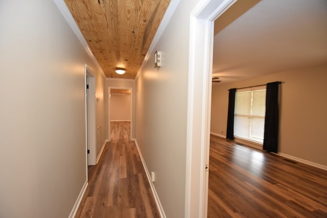 208 Pinehurst Dr, Enterprise, AL 36330 - corridor featuring wood ceiling, dark wood finished floors, ornamental molding, and baseboards