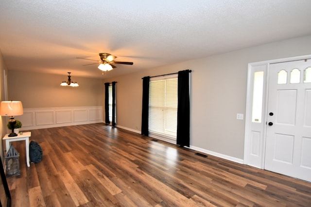208 Pinehurst Dr, Enterprise, AL 36330 - entryway featuring ceiling fan, dark wood-style floors, and a chandelier
