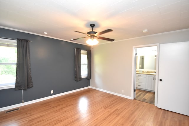 208 Pinehurst Dr, Enterprise, AL 36330 - spare room featuring healthy amount of natural light, ceiling fan, ornamental molding, light wood-style flooring, and baseboards