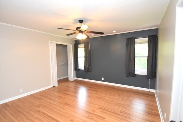 208 Pinehurst Dr, Enterprise, AL 36330 - unfurnished room featuring plenty of natural light, a ceiling fan, ornamental molding, and light wood-type flooring