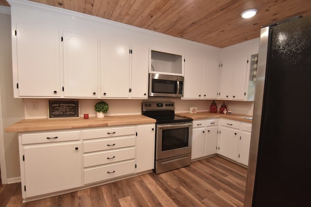 208 Pinehurst Dr, Enterprise, AL 36330 - kitchen with stainless steel appliances, wooden ceiling, wood finished floors, white cabinets, and open shelves