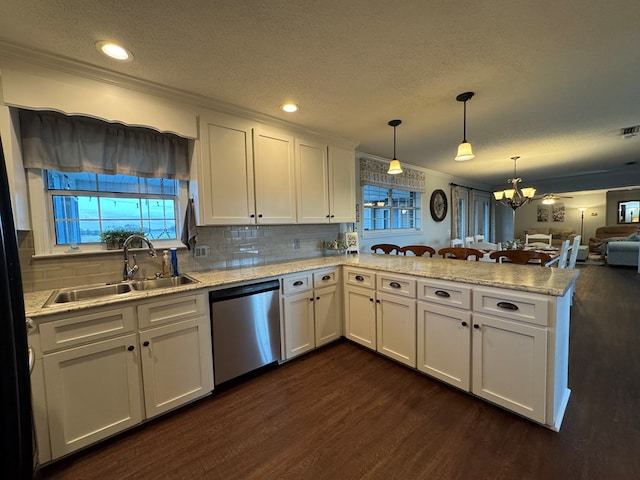 kitchen with white cabinetry, sink, and stainless steel dishwasher