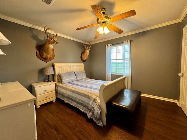 bedroom with ceiling fan, ornamental molding, and dark wood-type flooring