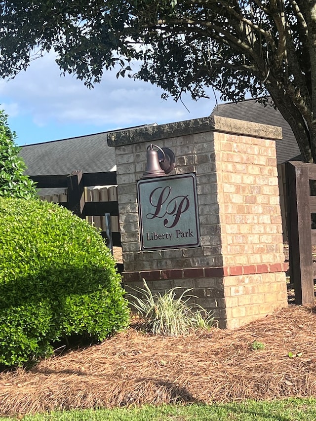 view of community sign