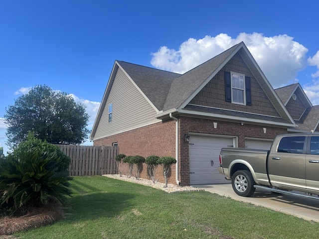 view of property exterior featuring a yard and a garage