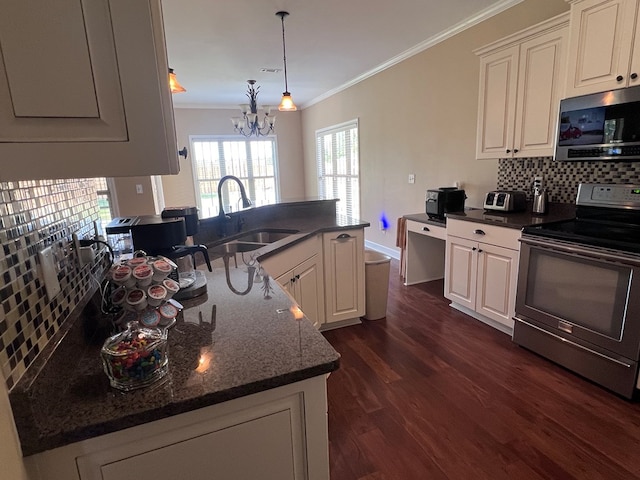 kitchen with sink, dark hardwood / wood-style floors, ornamental molding, white cabinetry, and stainless steel appliances