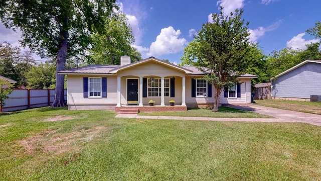single story home featuring a chimney, fence, central AC, a porch, and a front lawn