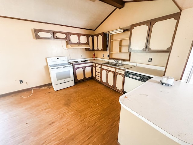 kitchen featuring white appliances, light wood-style flooring, light countertops, and a sink