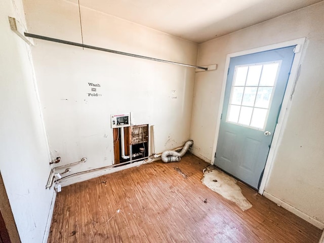 laundry room with laundry area and wood finished floors