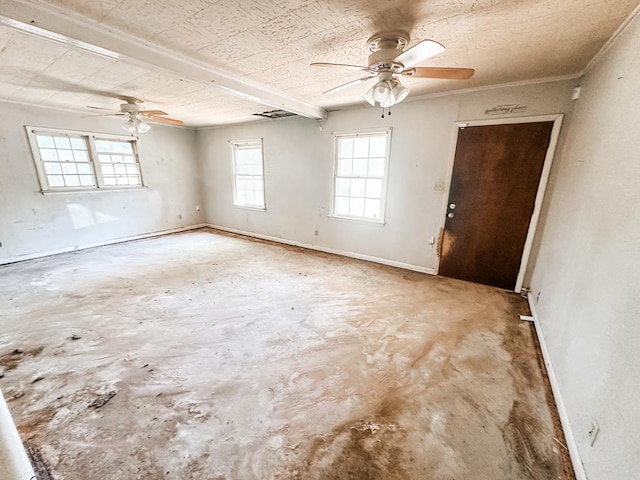 empty room with concrete floors, ceiling fan, and baseboards