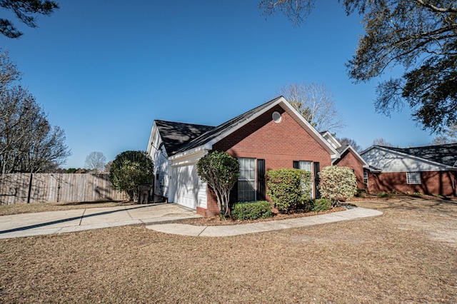 view of property exterior featuring a garage