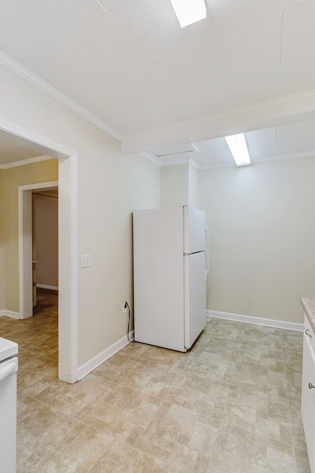 laundry room with crown molding