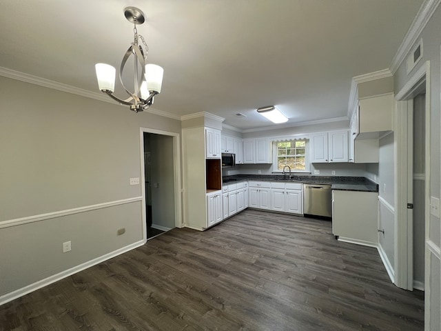 kitchen featuring sink, hanging light fixtures, ornamental molding, white cabinetry, and stainless steel appliances