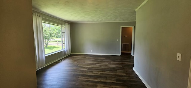 1109 Sumter St, Dothan, AL 36301 - unfurnished room with ornamental molding, dark wood-type flooring, and a textured ceiling