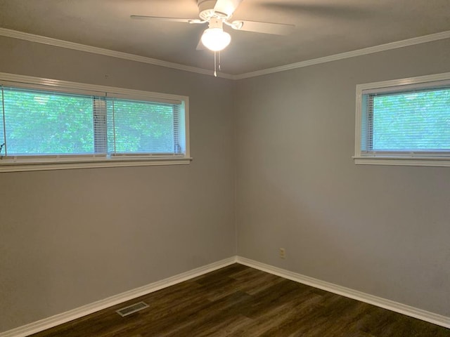 1109 Sumter St, Dothan, AL 36301 - spare room featuring dark wood finished floors, ceiling fan, and crown molding