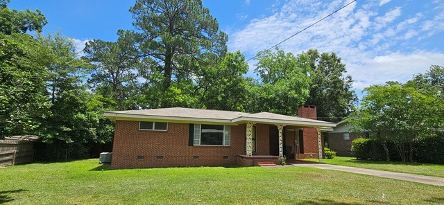 1109 Sumter St, Dothan, AL 36301 - view of front of property featuring crawl space, a chimney, driveway, and brick siding