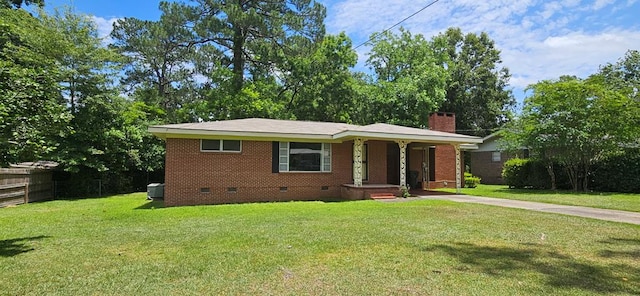 1109 Sumter St, Dothan, AL 36301 - view of front of home featuring crawl space, a chimney, and brick siding
