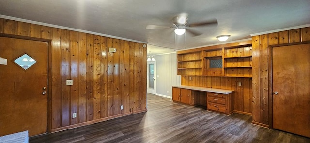 1109 Sumter St, Dothan, AL 36301 - unfurnished office with ceiling fan, ornamental molding, dark wood-style flooring, and wood walls