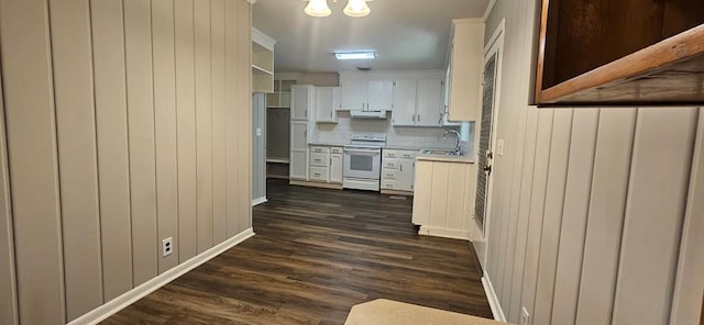1109 Sumter St, Dothan, AL 36301 - kitchen with range, range hood, light countertops, dark wood finished floors, and white cabinetry