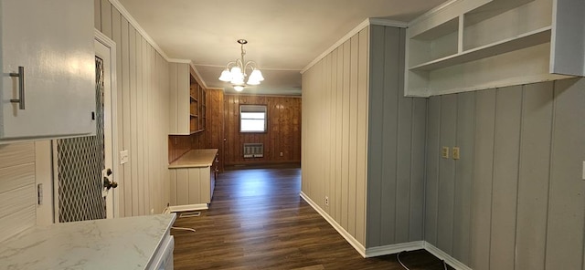 1109 Sumter St, Dothan, AL 36301 - corridor with a chandelier, dark wood-type flooring, and ornamental molding