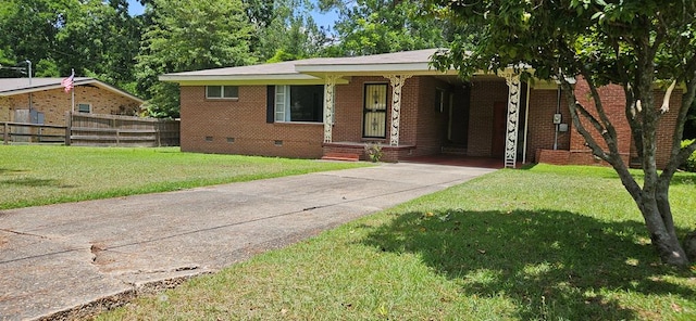 1109 Sumter St, Dothan, AL 36301 - view of front of property featuring driveway, a carport, brick siding, and crawl space