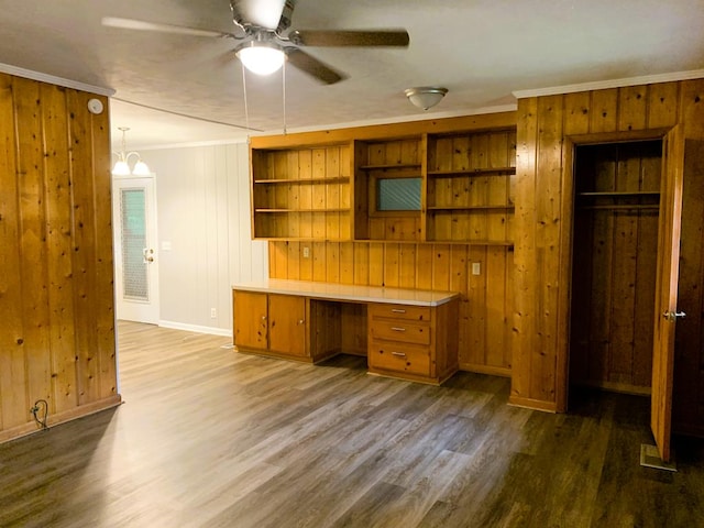 1109 Sumter St, Dothan, AL 36301 - unfurnished office featuring ornamental molding, wood walls, ceiling fan, and wood finished floors