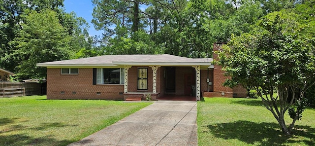1109 Sumter St, Dothan, AL 36301 - view of front facade featuring crawl space, concrete driveway, an attached carport, brick siding, and a chimney