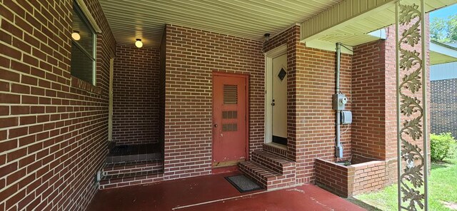 1109 Sumter St, Dothan, AL 36301 - view of exterior entry featuring brick siding
