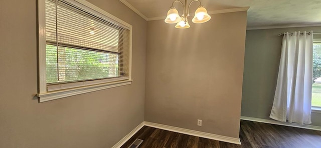 1109 Sumter St, Dothan, AL 36301 - unfurnished room with a chandelier, dark wood-style floors, and ornamental molding