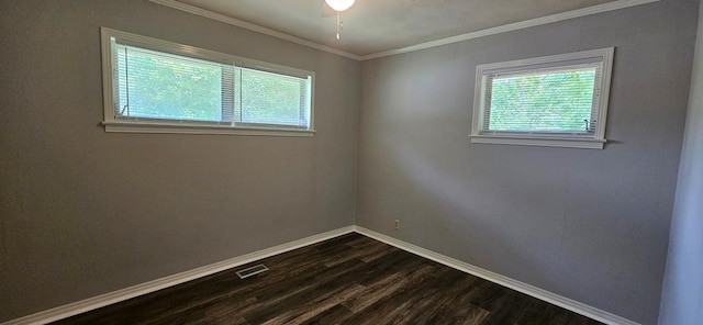 1109 Sumter St, Dothan, AL 36301 - spare room with healthy amount of natural light, dark wood-style floors, and crown molding