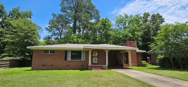 1109 Sumter St, Dothan, AL 36301 - view of front of home featuring crawl space, concrete driveway, a chimney, an attached carport, and brick siding