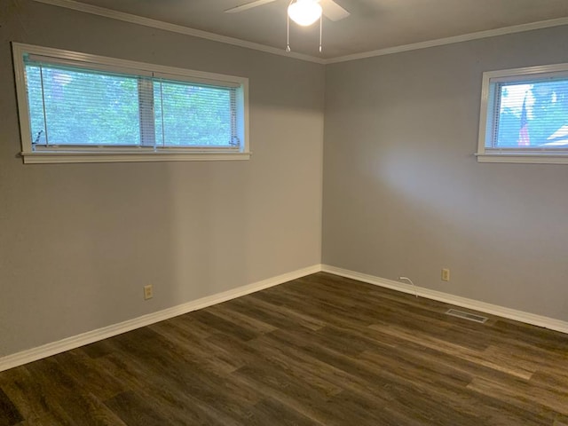 1109 Sumter St, Dothan, AL 36301 - unfurnished room with dark wood finished floors, plenty of natural light, ceiling fan, and ornamental molding