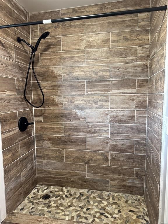 bathroom featuring a shower stall