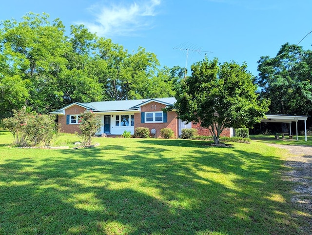 602 Cobb Rd, Dothan, AL 36301 - view of front of property featuring a front yard, a carport, and brick siding