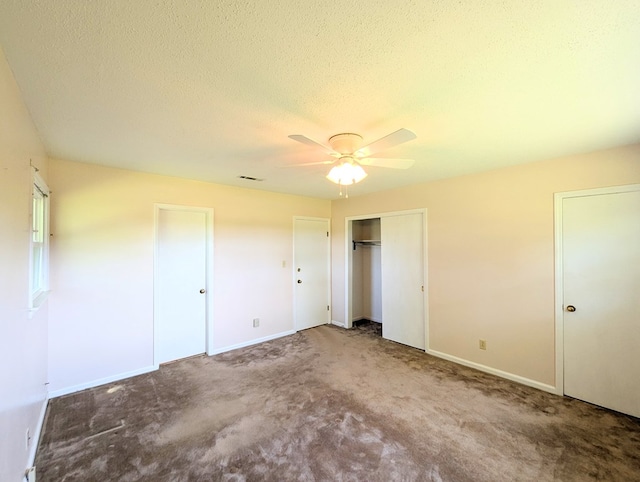 602 Cobb Rd, Dothan, AL 36301 - unfurnished bedroom with carpet floors, a textured ceiling, and a ceiling fan
